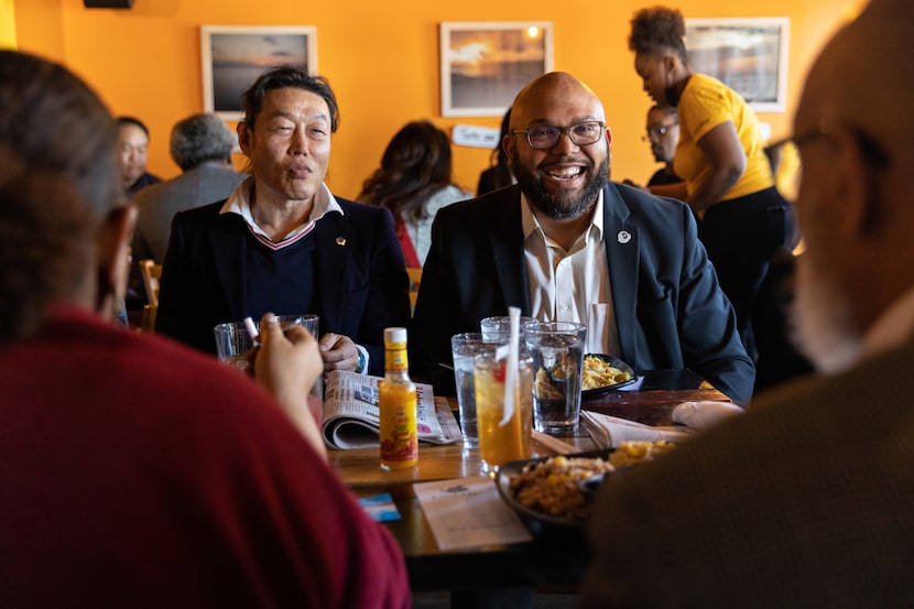 Jonas Park (left) and Matt Houston were among attendees at the meeting of Dallas' Black and...