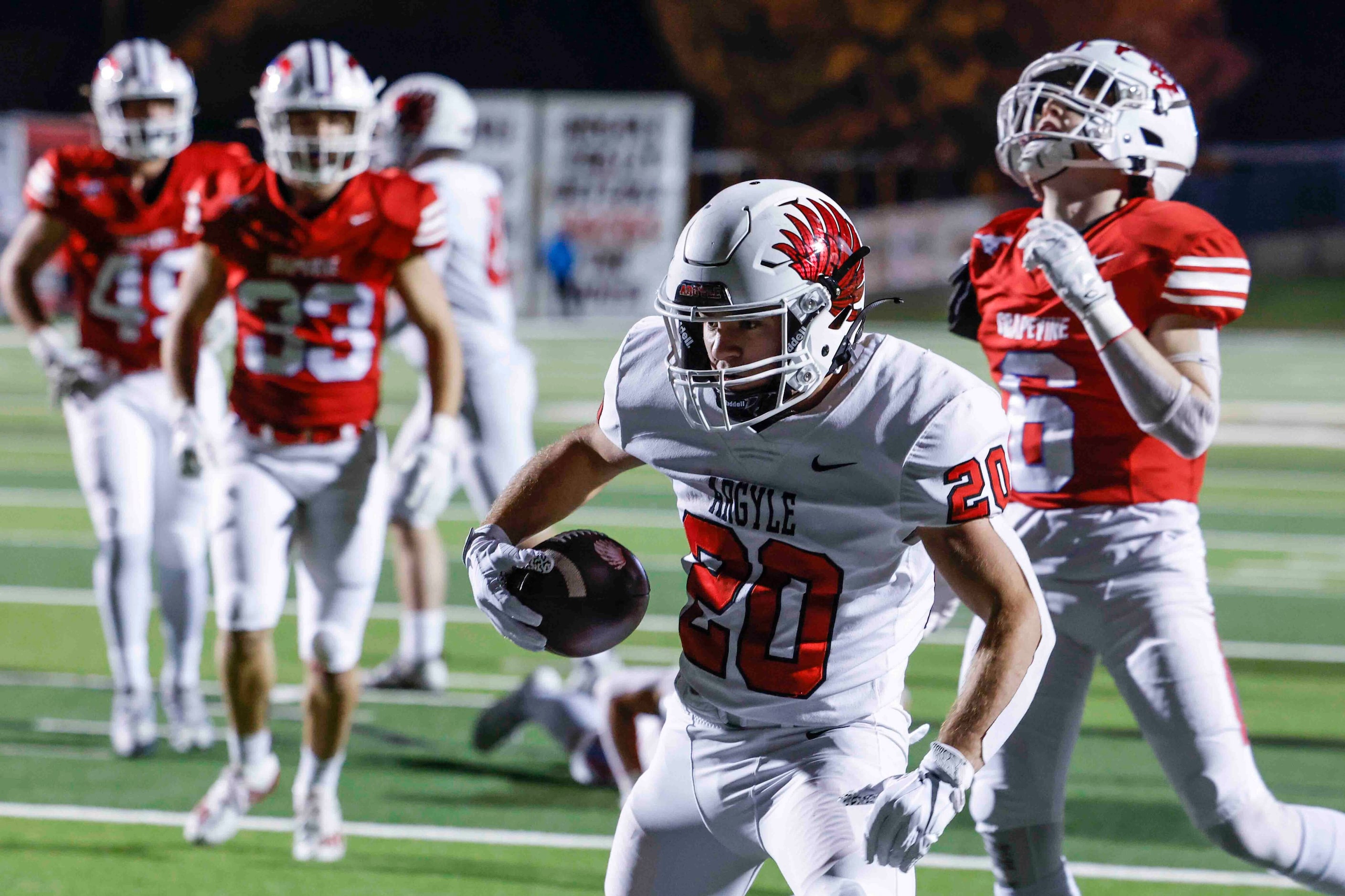 Argyle High’s Landon Farris (20) completes a touchdown during the first half of a football...