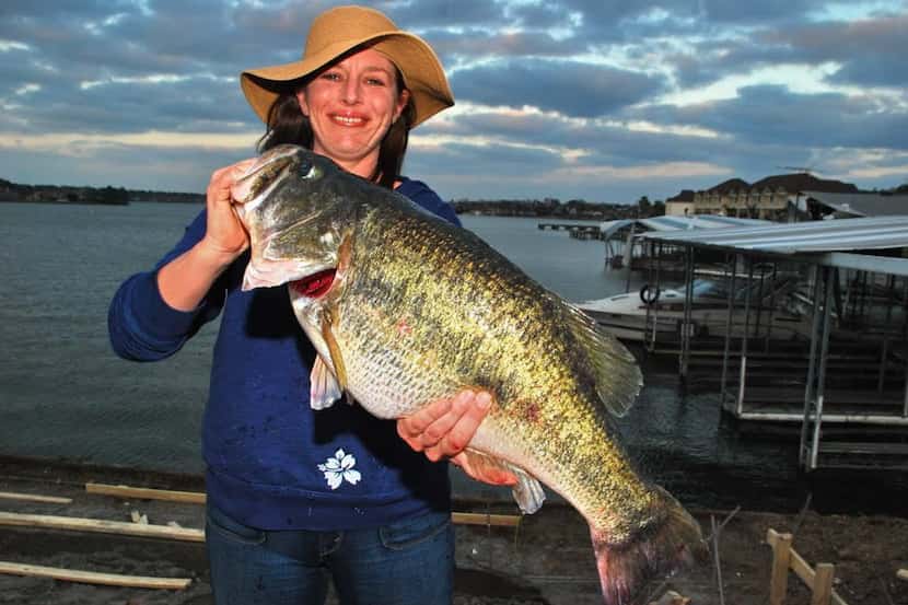 This is one of Larry Hodge's favorite ShareLunker photos, Renee Linderoth with a 2009 Lake...