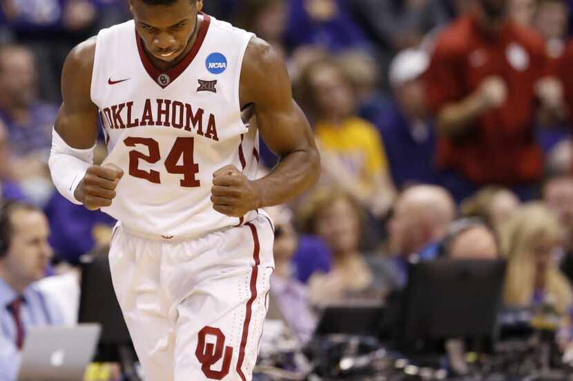 Oklahoma Sooners guard Buddy Hield (24) celebrates after hitting a three pointer during the...