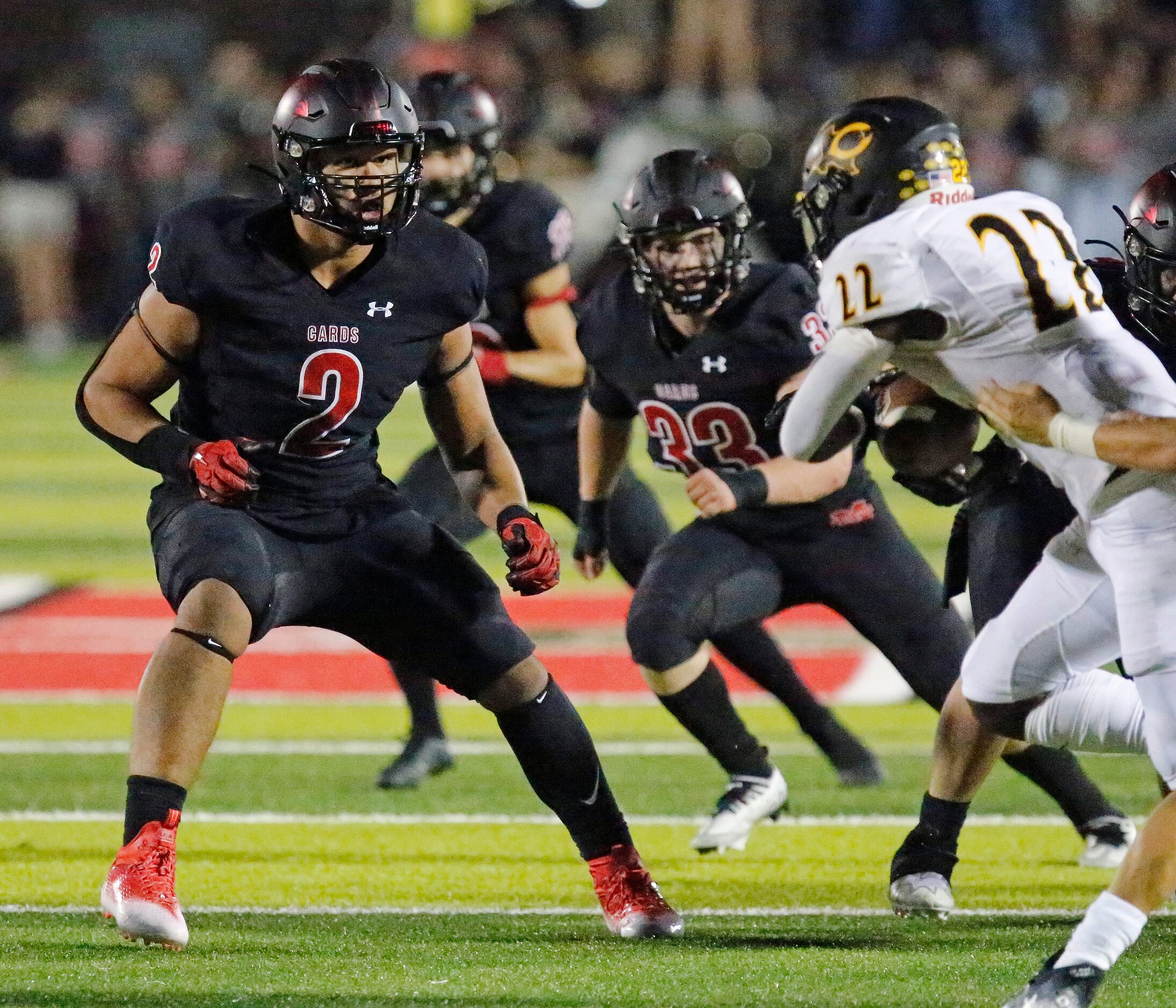 Melissa High School defensive end Nigel Smith (2) reads a play during the first half as...