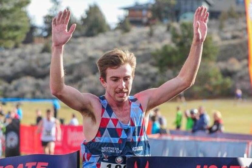 Craig Lutz crossing the tape at the USATF Men's Cross Country Championships in Ben d,...