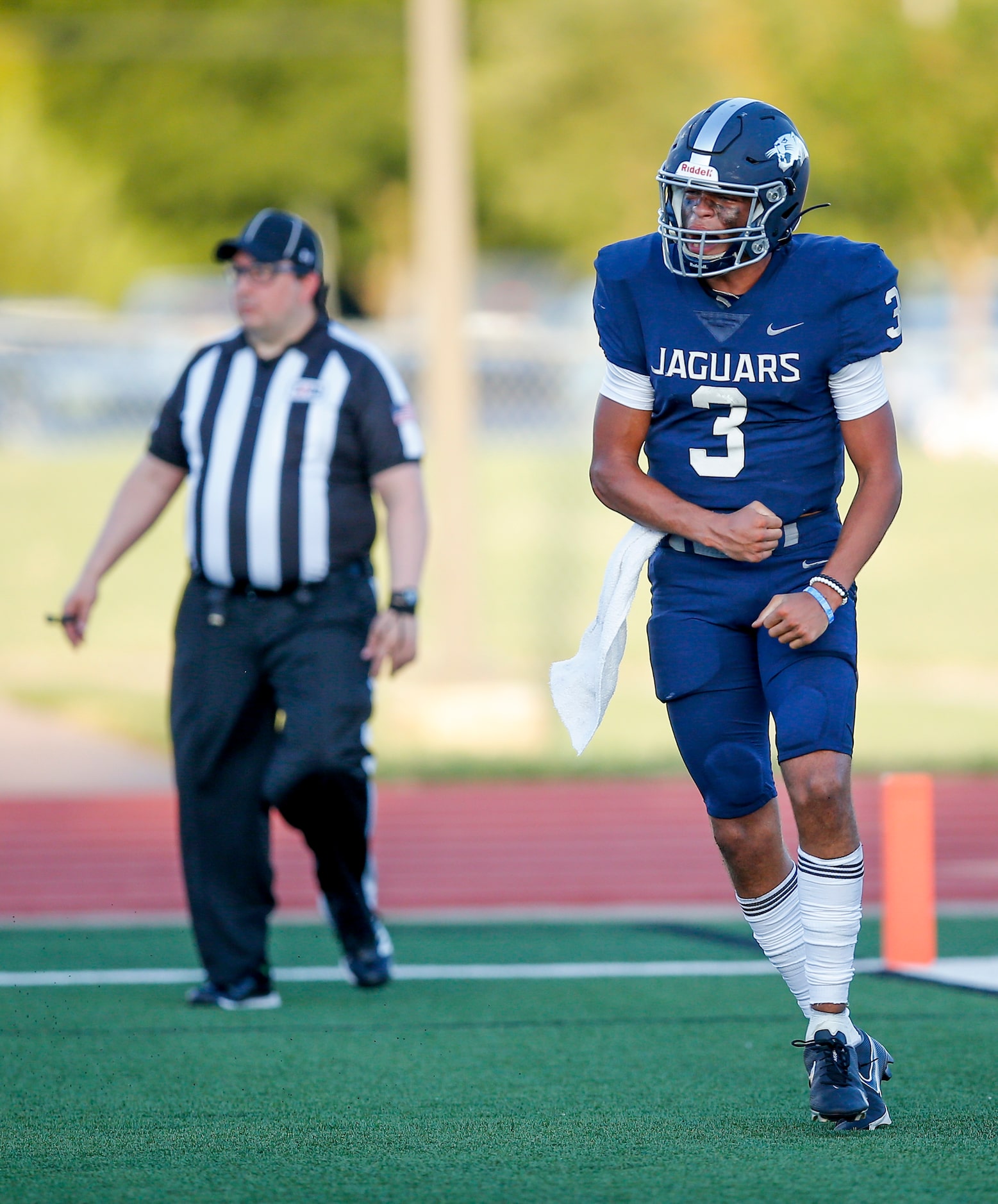 Flower Mound senior quarterback Nick Evers (3) celebrates scoring a touchdown during the...