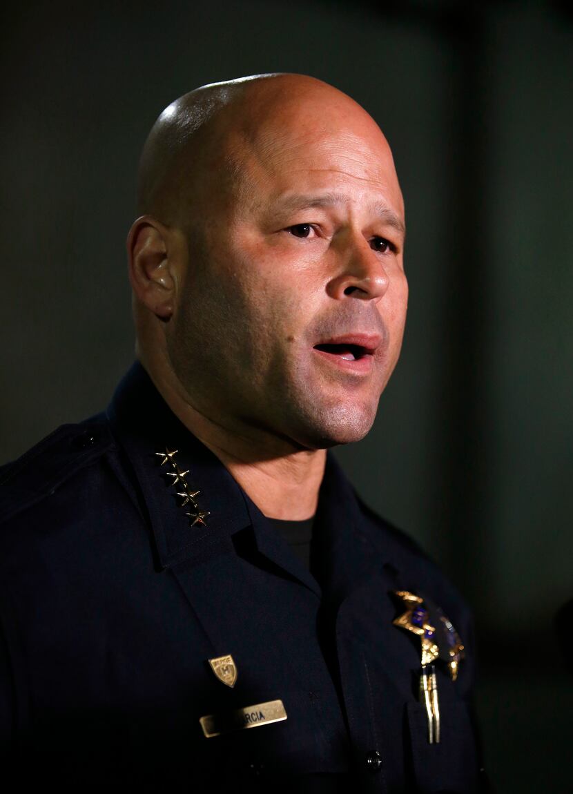 San Jose Police Chief Eddie Garcia answers questions from reporters after announcing the...