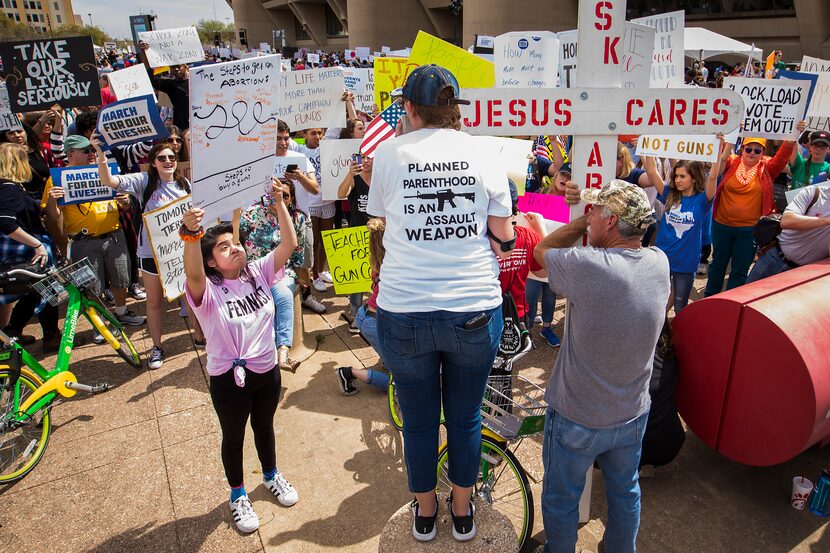 Counter protestors face off with demonstrators before the march.