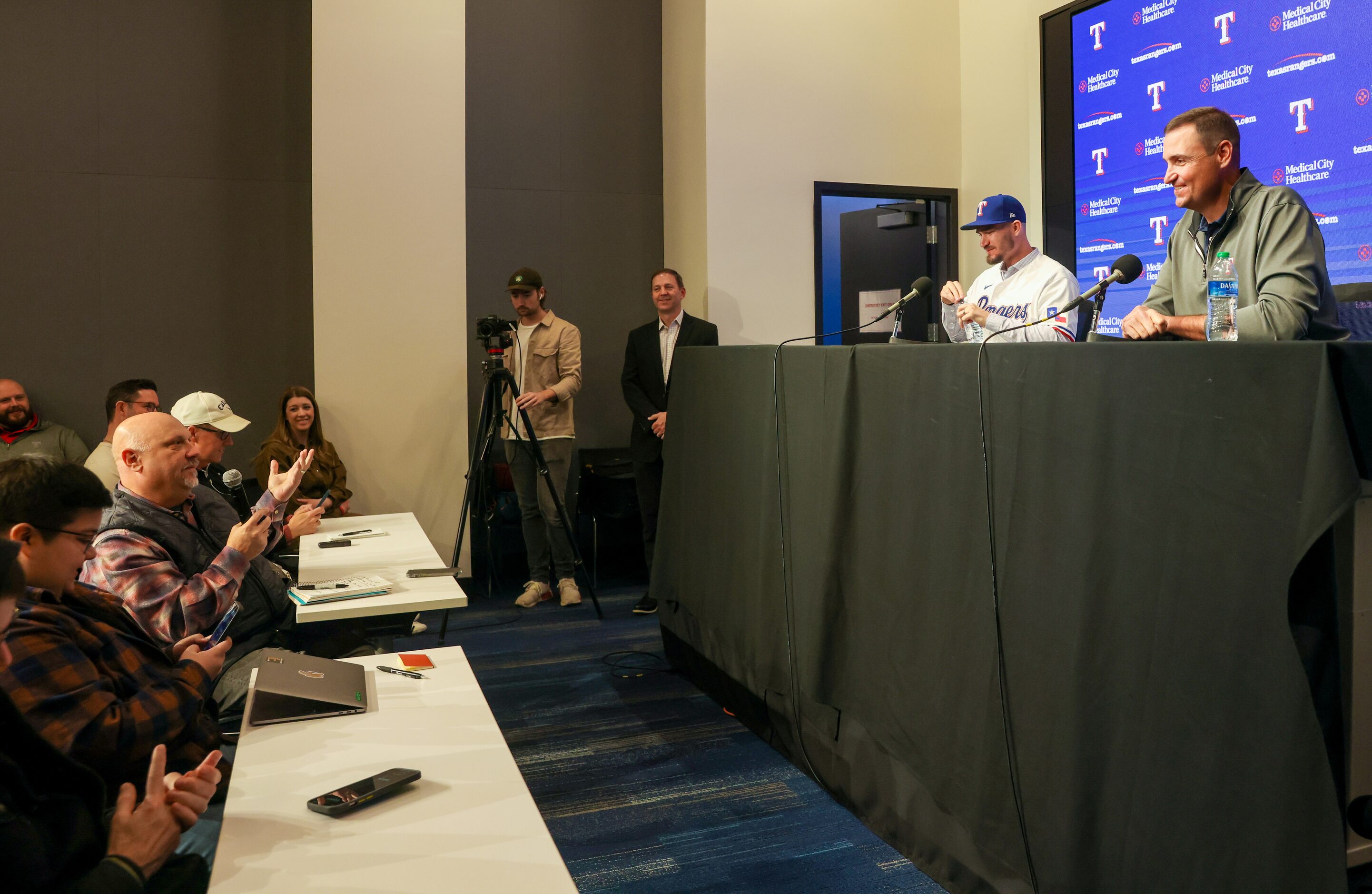 Pitcher Andrew Heaney (left) is introduced by Texas Rangers general manager Chris Young...