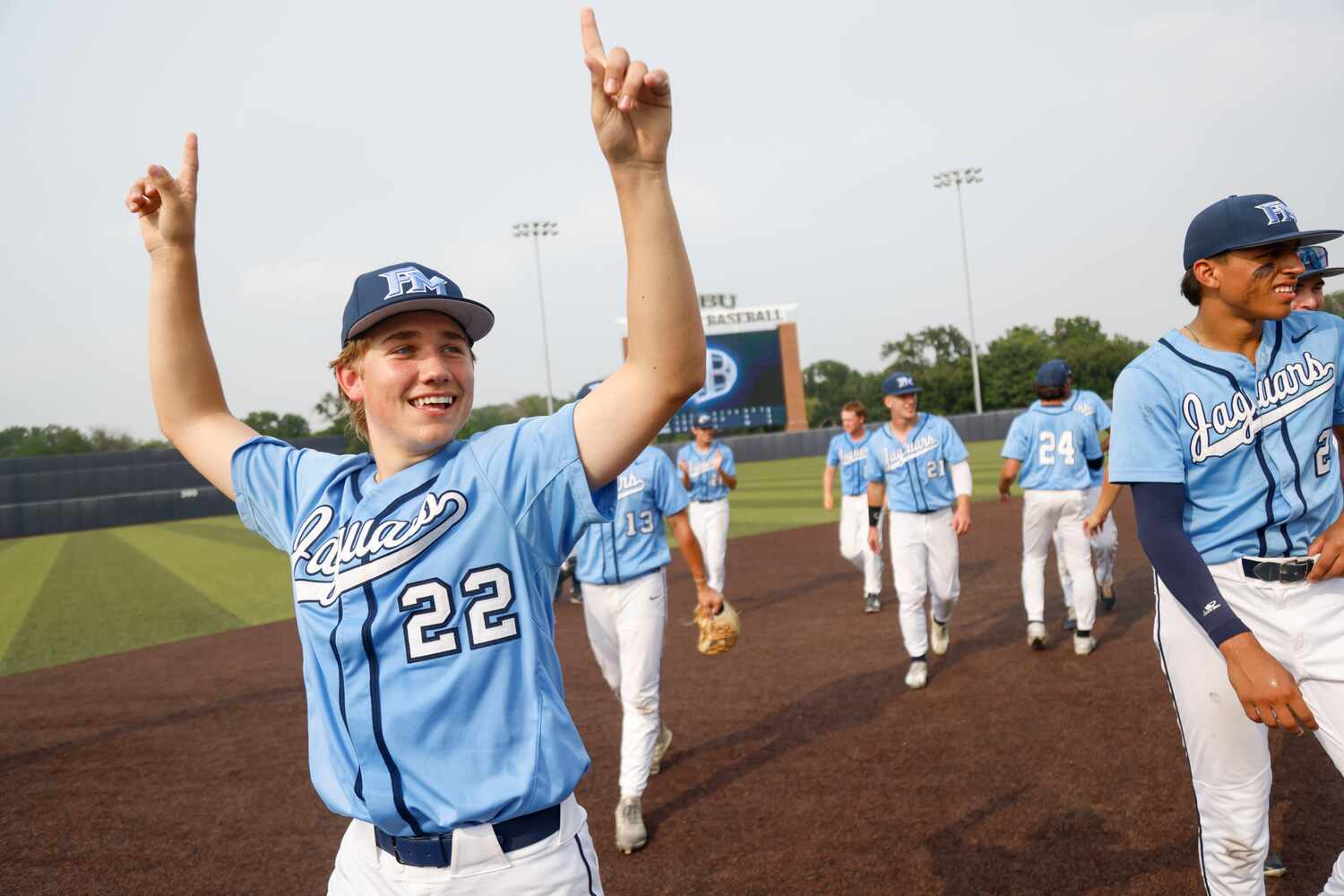 Flower Mound player Grant Plasek (22) celebrates after Game 3 of a best-of-3 Class 6A Region...