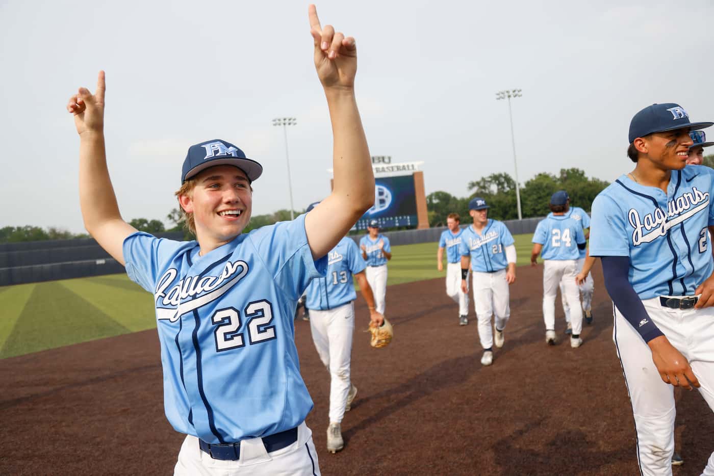Flower Mound player Grant Plasek (22) celebrates after Game 3 of a best-of-3 Class 6A Region...