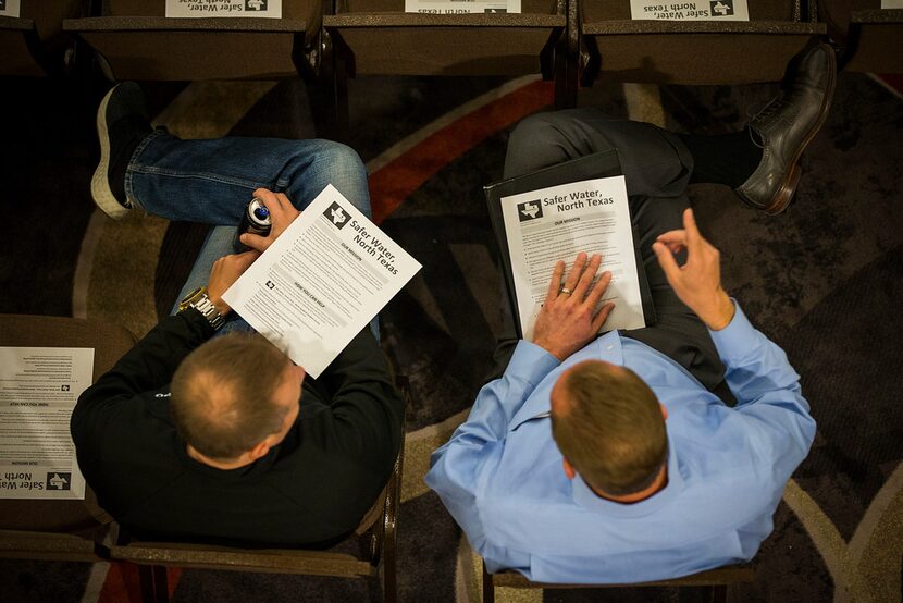 Community members wait for environmental activist Erin Brockovich to speak before a town...