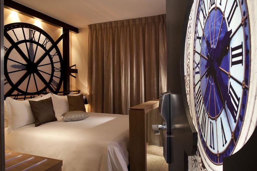 Above:   Have a grand  time sleeping beneath a replica of the Musée  d’Orsay clock at the...