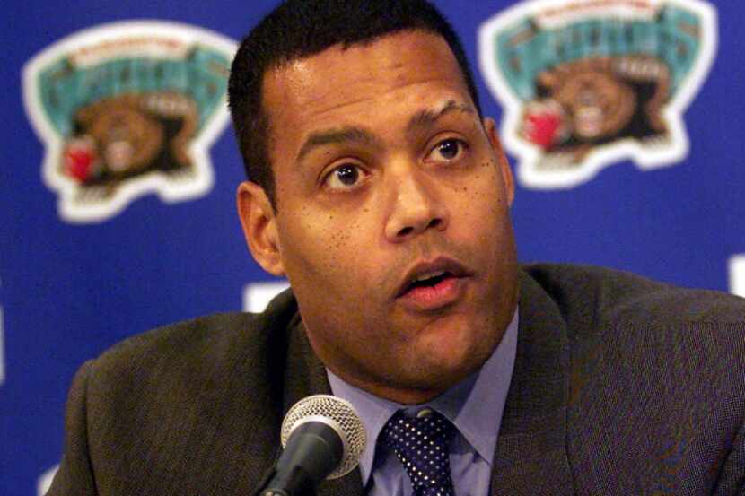 Former Vancouver Grizzlies GM Stu Jackson talks to reporters at half-time during Thursday's...