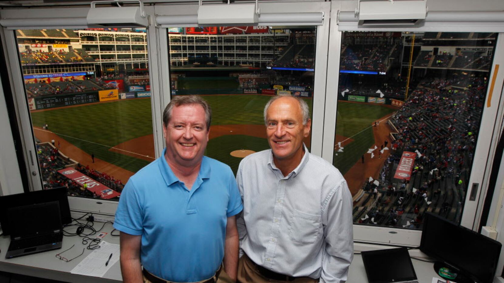 FILE - Texas Rangers broadcasters Matt Hicks (left) and Eric Nadel are pictured at Globe...