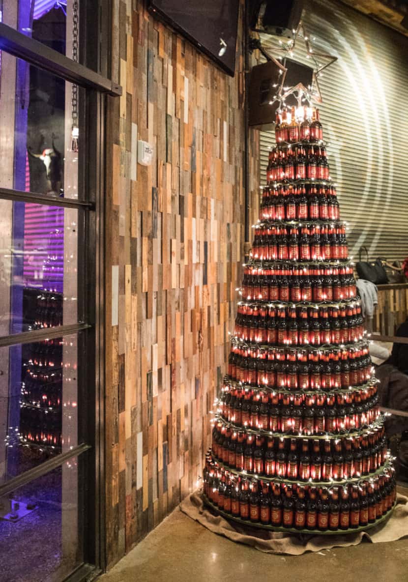 The Rustic in Uptown Dallas has a beer bottle Christmas tree, and on Dec. 25, guests can...