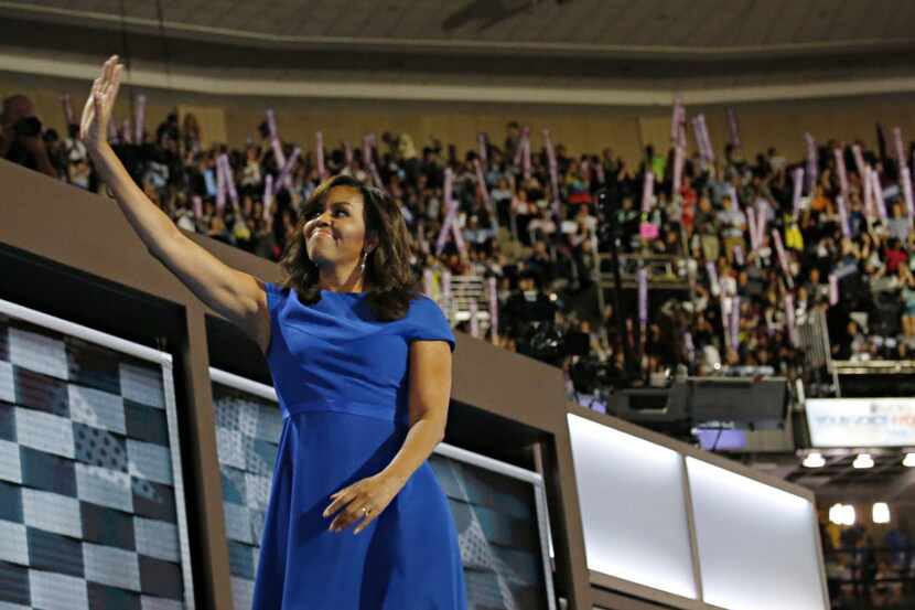 First Lady Michelle Obama waved as she left the stage during the Democratic National...