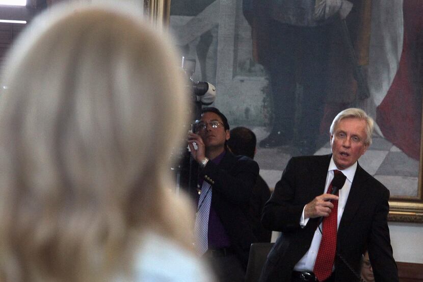 
State Sen. Bob Deuell questions Wendy Davis as she filibusters during the final day of the...