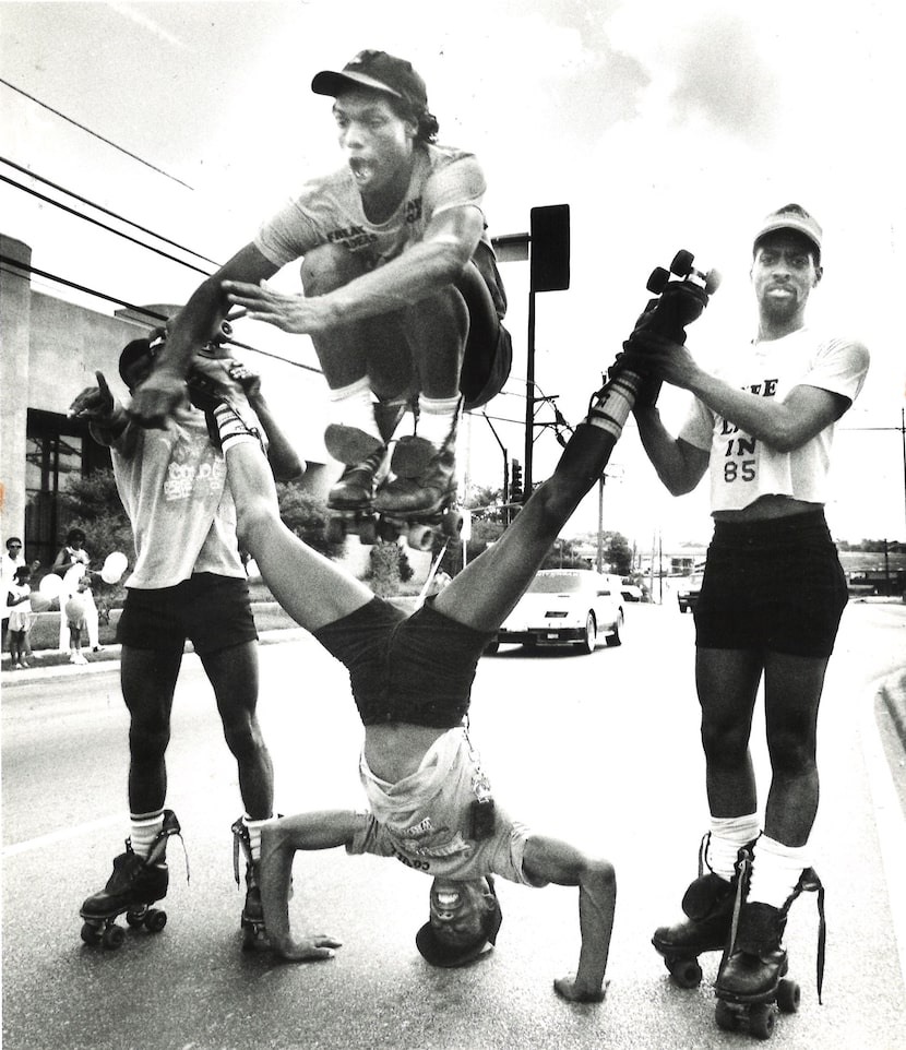 Stanley Beasley jumped over Billy Parker who was supported by Shawn Wilson and Robert...