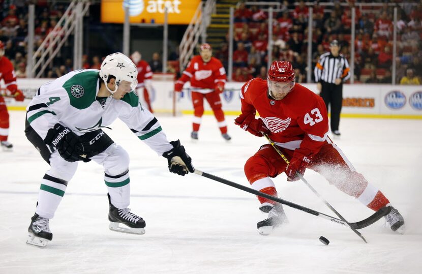 Detroit Red Wings center Darren Helm (43) skates against Dallas Stars defenseman Jason...