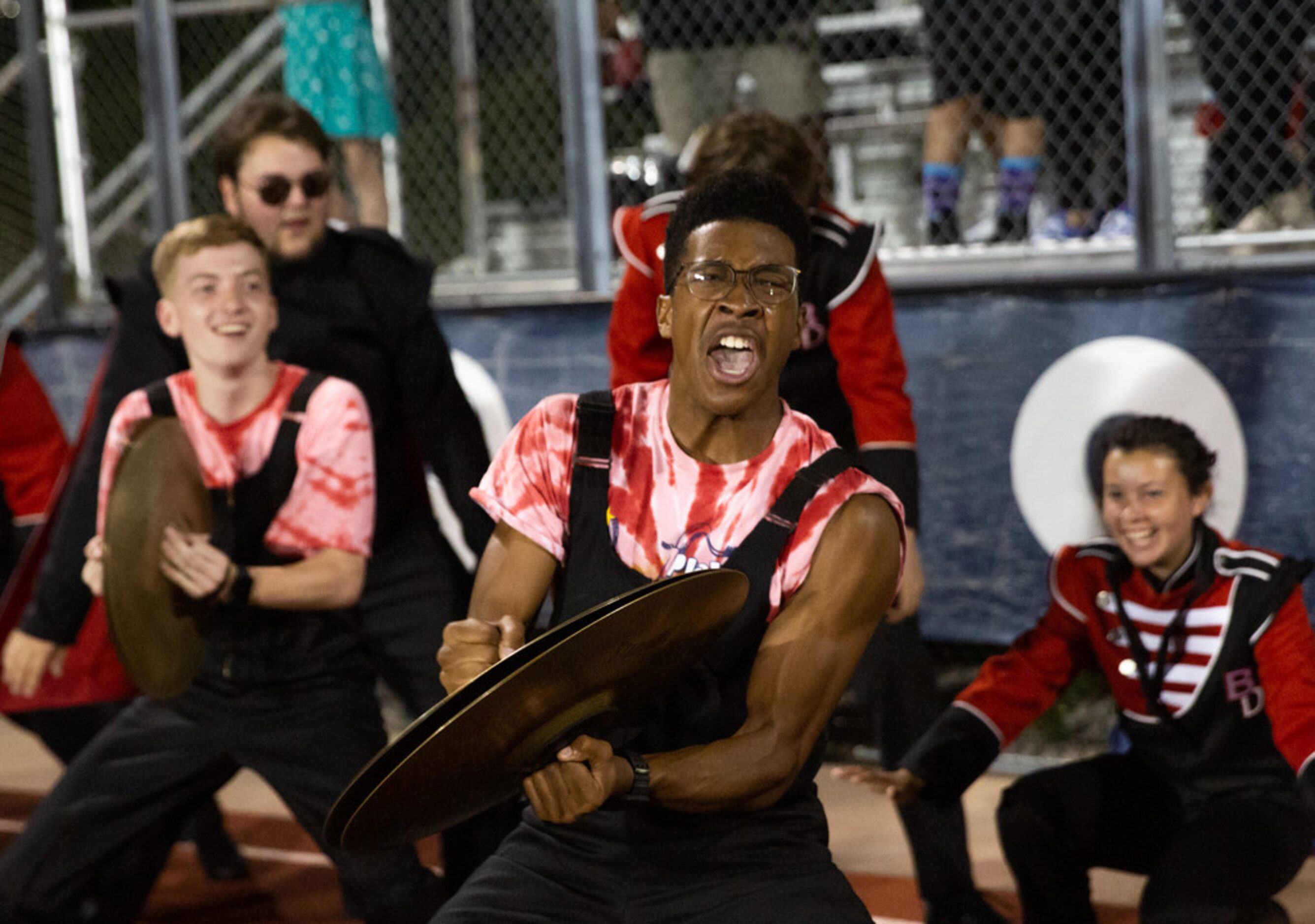 Dorien Casey-Franklin , 17 (center), co-leads the Bishop Dunne Catholic School Falcon Band...