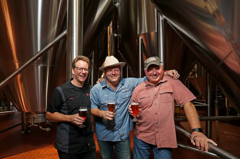 L to R, Brewmaster Grant Wood, founders Rhett and Ron Keisler of Revolver Brewing. The...