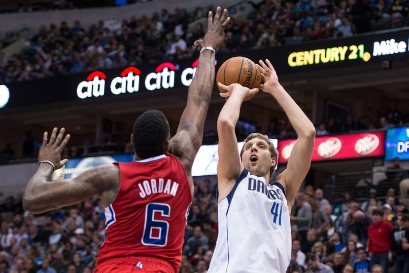 Jan 3, 2014; Dallas, TX, USA; Dallas Mavericks power forward Dirk Nowitzki (41) shoots a...