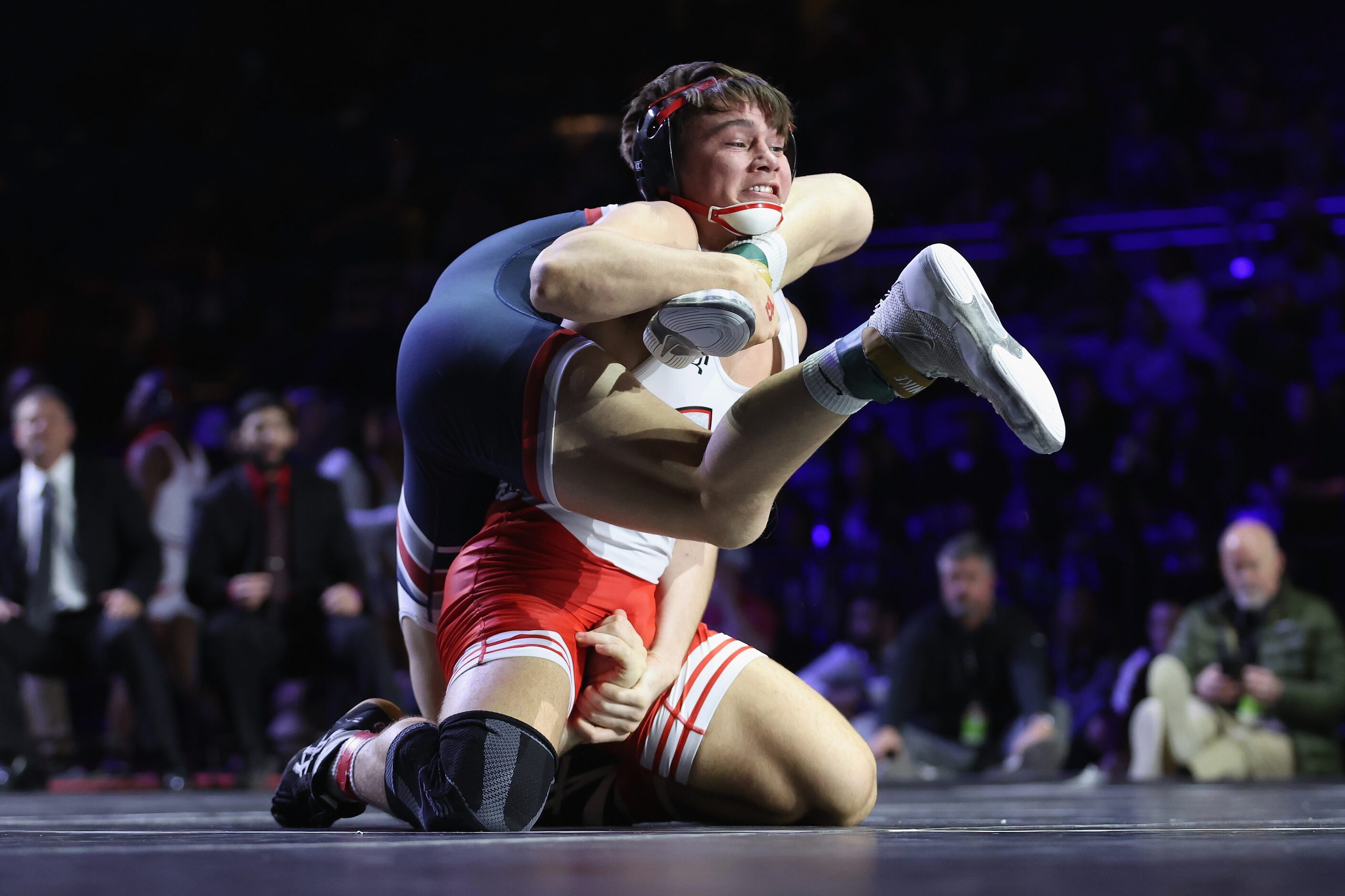 Grayson Carpenter of Arlington Martin (red) competes against Matteo Nikolov of Katy Tompkins...