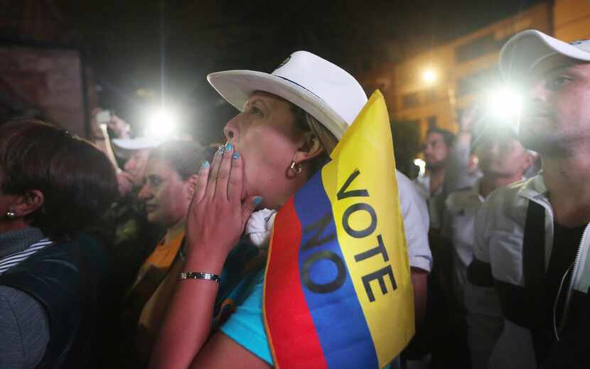 "No" supporters gathered Sunday at a rally in Bogota, Colombia, following their victory in...