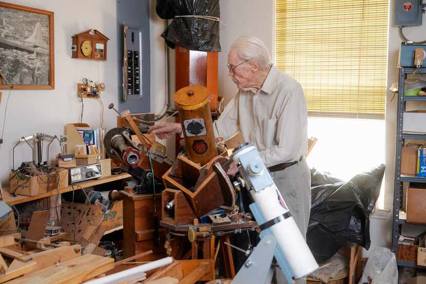 LaVerne Biser, 105, shows off his handmade telescopes at his home in Fort Worth, Texas....