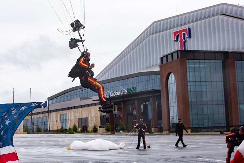 President of the All Veteran Group Mike Elliott lands at the Globe Life Field parking lot...