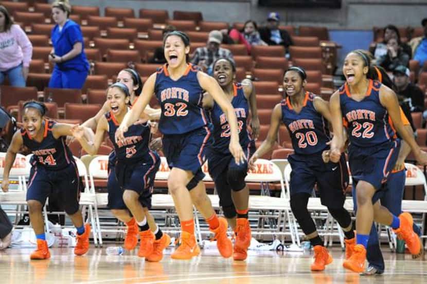 
McKinney North celebrates a win over Brennan after the UIL 4A state semi-final girls...