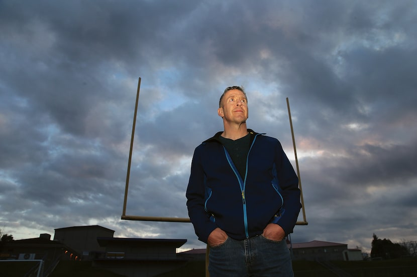 Former Bremerton High School assistant football coach Joe Kennedy stands on the field at...