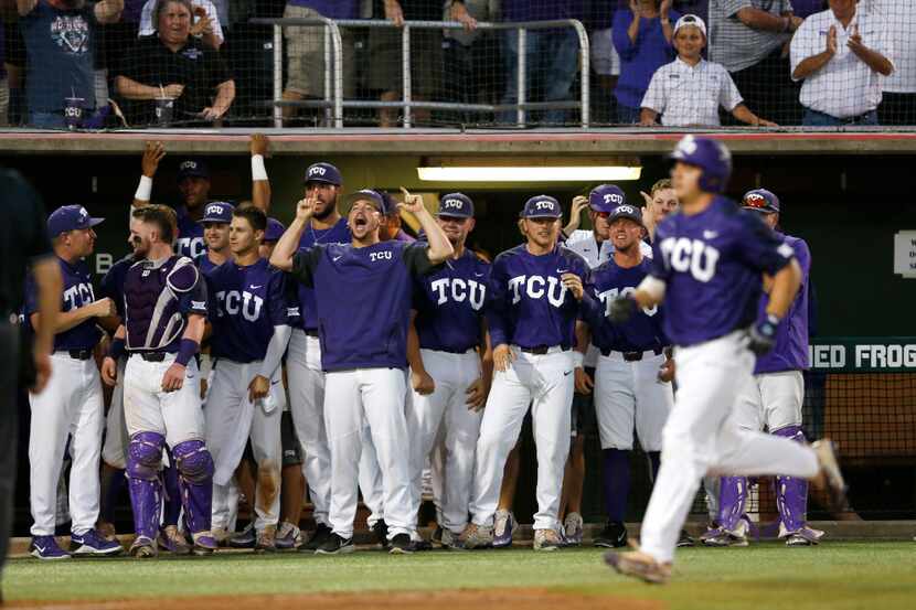 TCU celebrates as TCU outfielder Josh Watson (7) makes his way to home plate after hitting a...