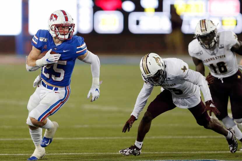 FILE - SMU running back T.J. McDaniel (25) rushes upfield during a game against Texas State...