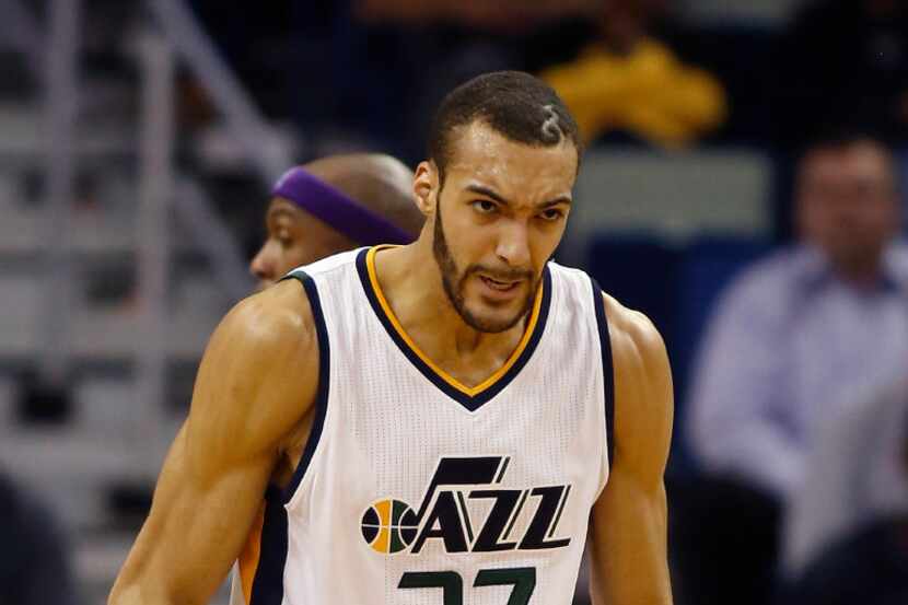 Utah Jazz center Rudy Gobert reacts after a play against the New Orleans Pelicans during the...