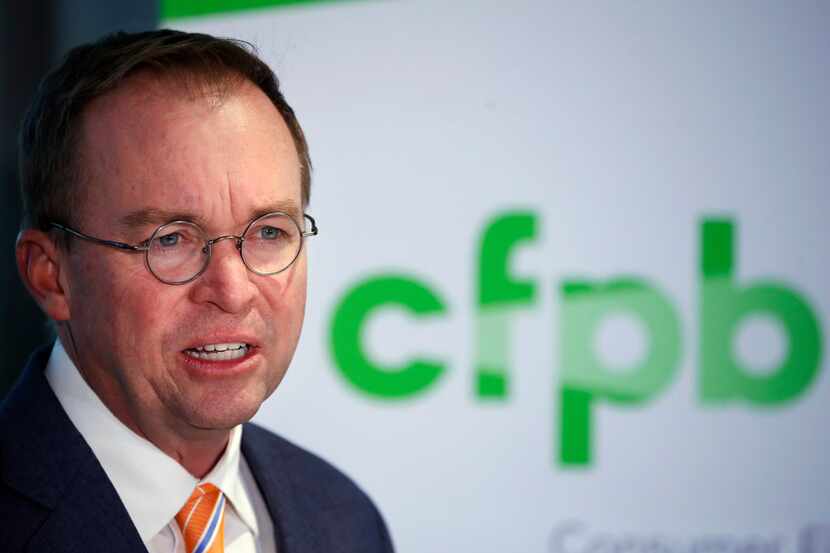 Mick Mulvaney speaks during a news conference after his first day as acting director of the...