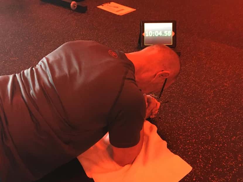 Chad Daley of Frisco had never planked for time before the day he won the OrangeTheory...