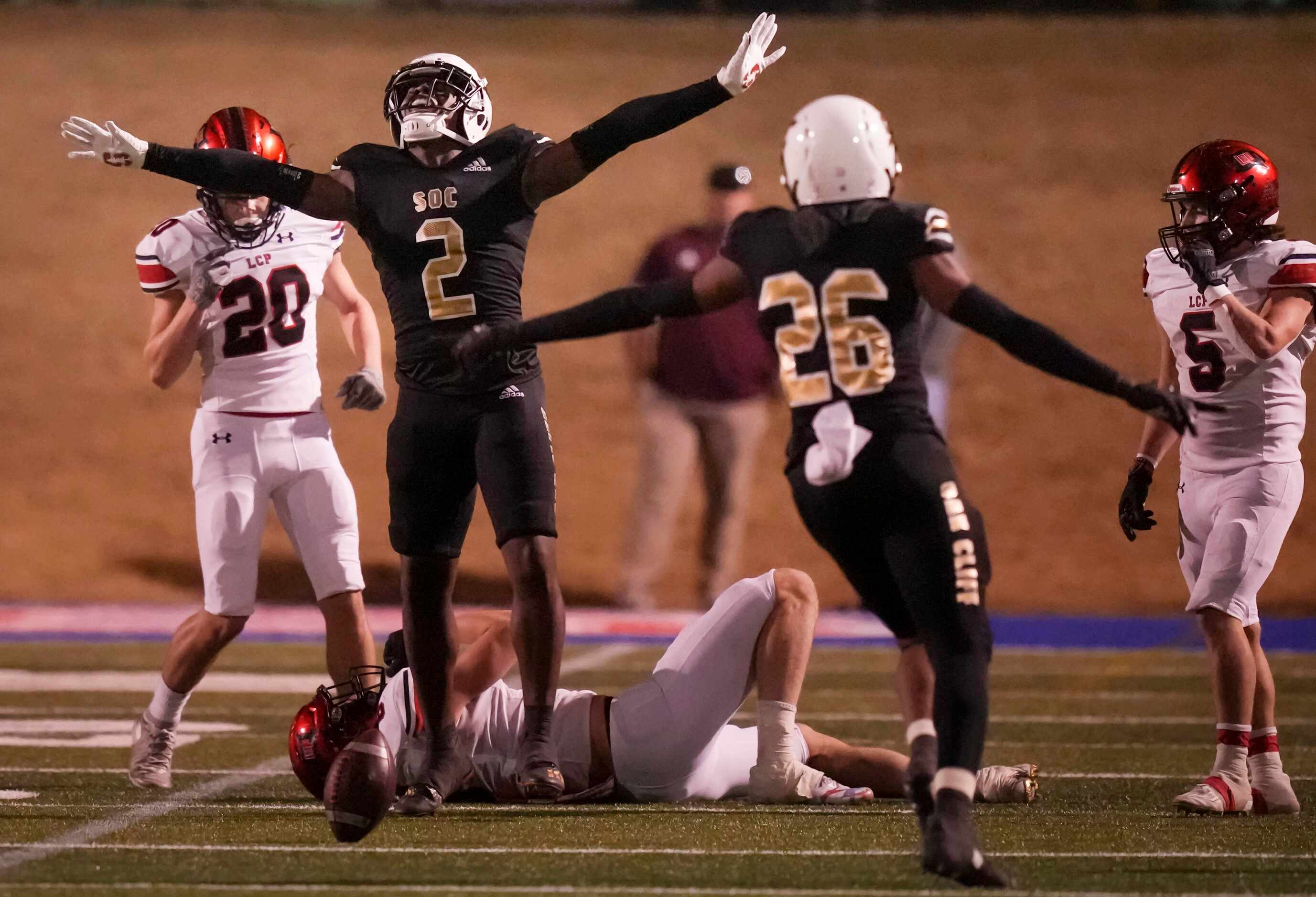 South Oak Cliff defensive back Kyron Chambers (2) celebrates after breaking up a pass...