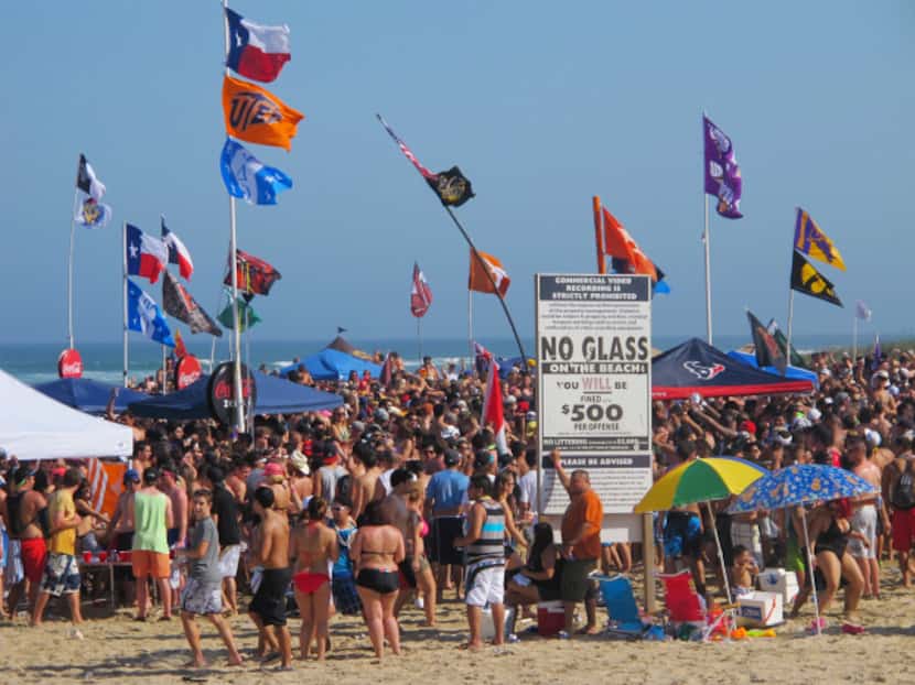 Spring breakers pack South Padre Island's expansive beach, which the island mostly welcomes....