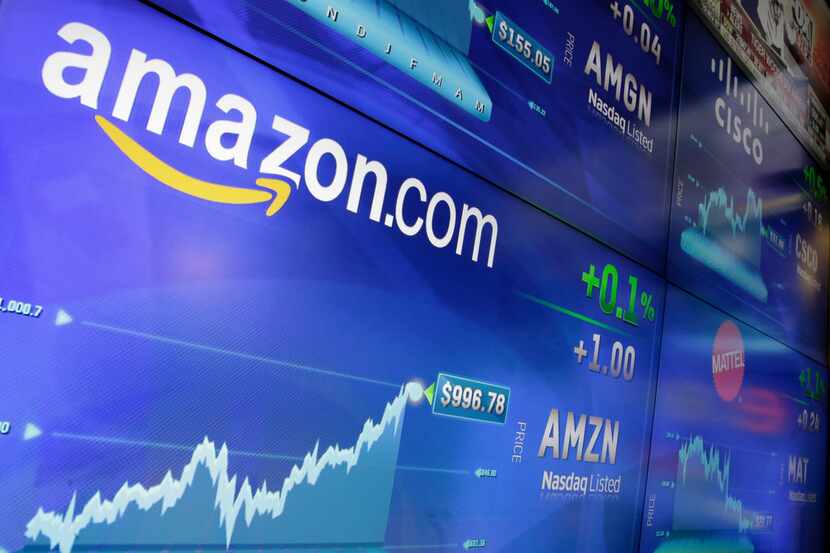 In this file photo, the Amazon logo is displayed at the Nasdaq MarketSite, in New York's...