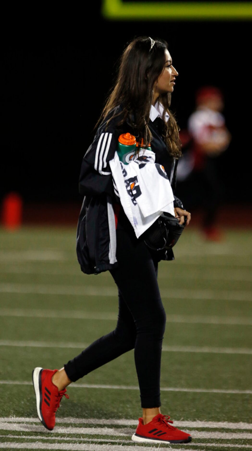 Mesquite Horn Homecoming Queen Melanie Arciniega, who is also a team trainer, performs her...