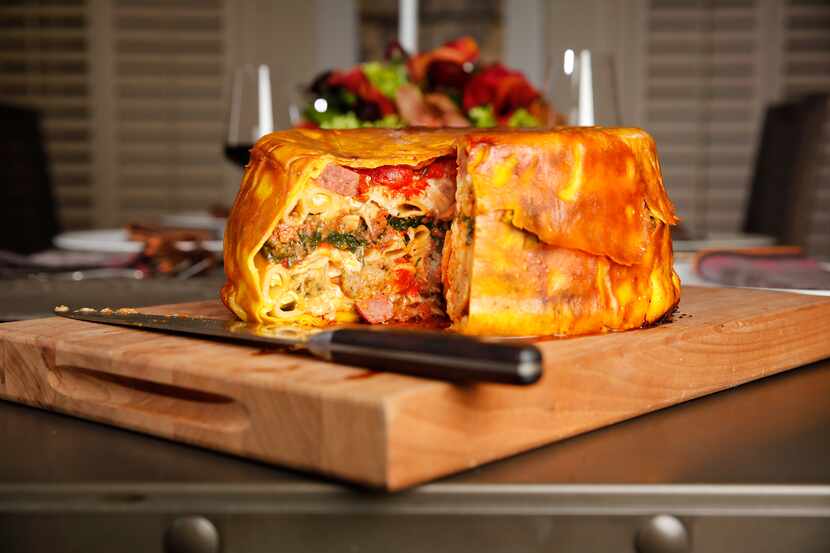 Julian Barsotti's  timpano, a colossal, 21-layer creation that contains the flavors of an...