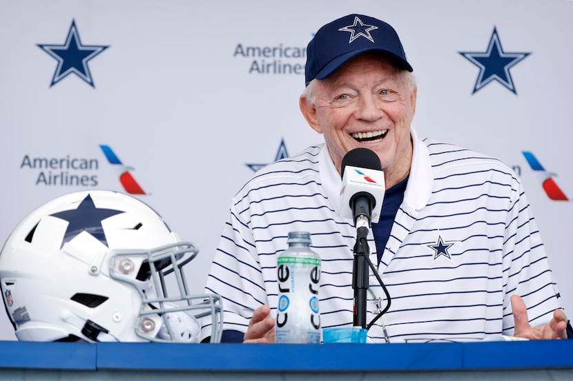 Dallas Cowboys owner Jerry Jones jokes with the media during the teams kickoff press...