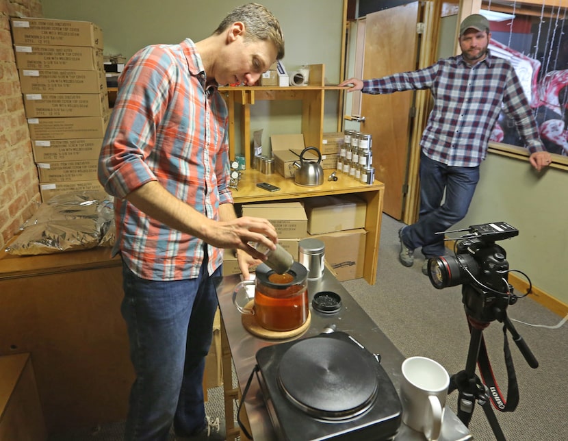 Brandon Friedman, left, and Terrence Kamauf
make tea at the offices of Rakkasan Tea Company...