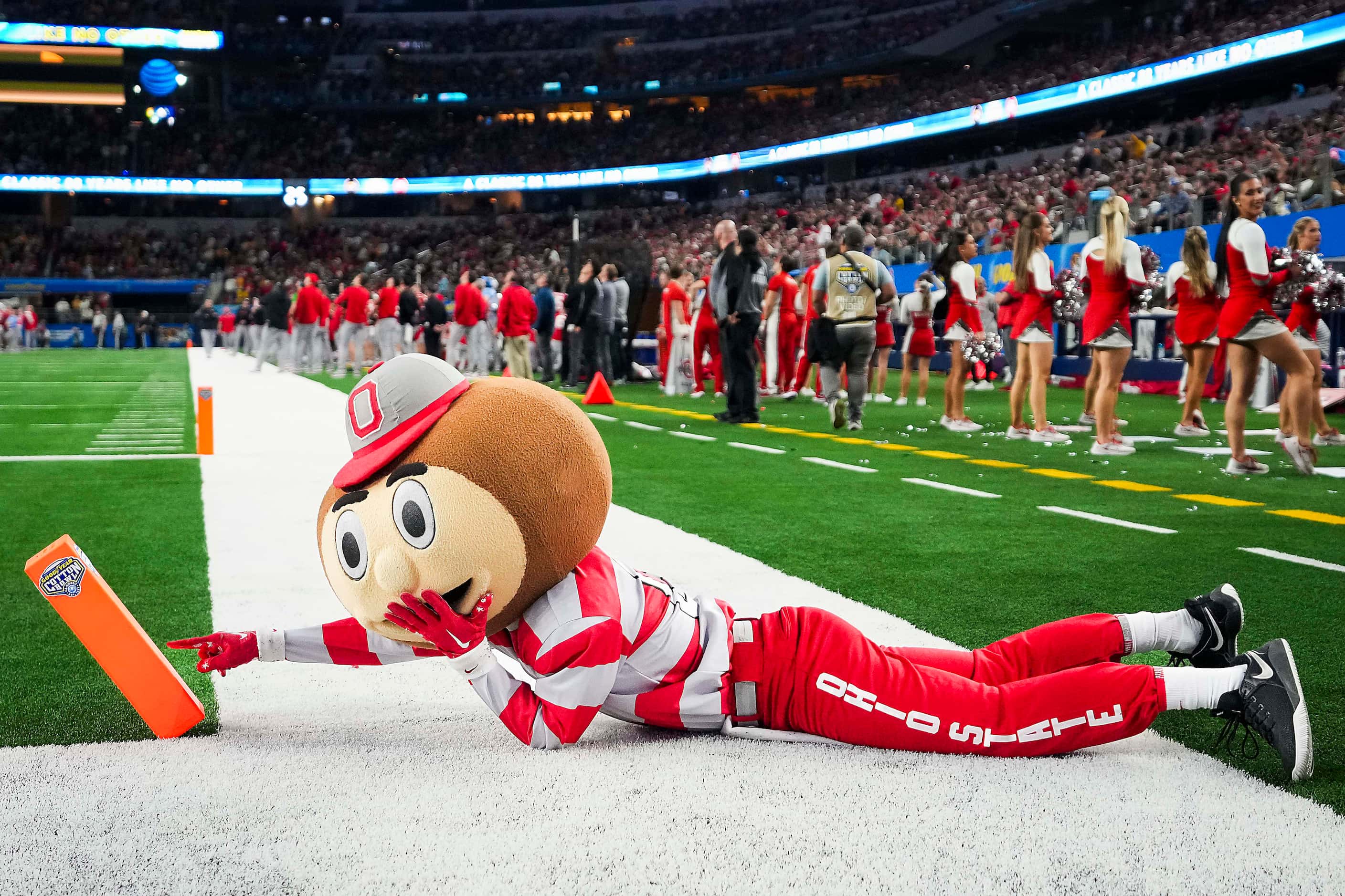 Ohio State mascot Brutus tips over an end zone marker during the second half of the Goodyear...