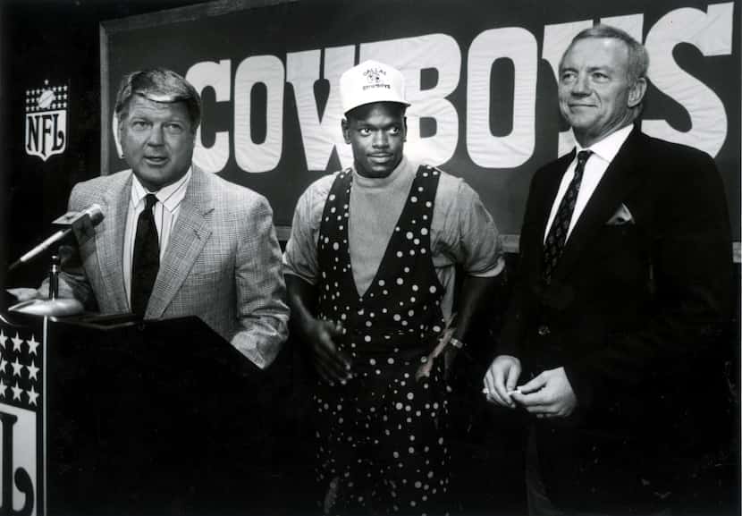 Cowboys head coach Jimmy Johnson welcomes Cowboys No. 1 draft pick Emmitt Smith along with...