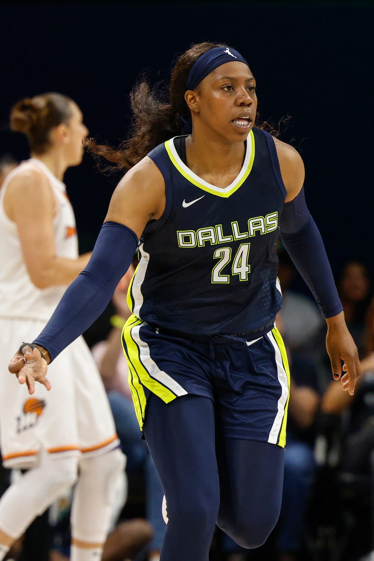 Dallas Wings guard Arike Ogunbowale (24) celebrates a three-point shot during the second...