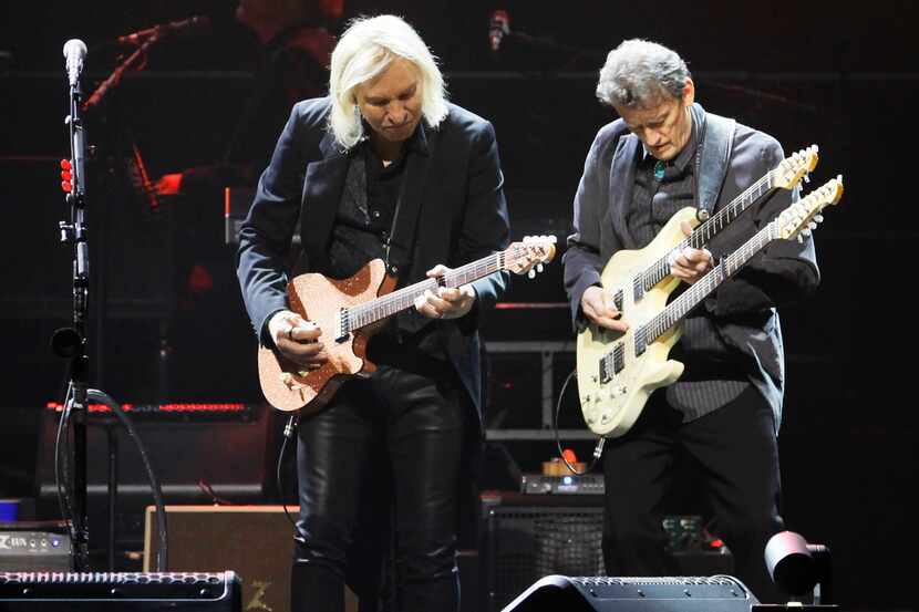 Members of the American rock band the Eagles performs at the American Airlines Center in...