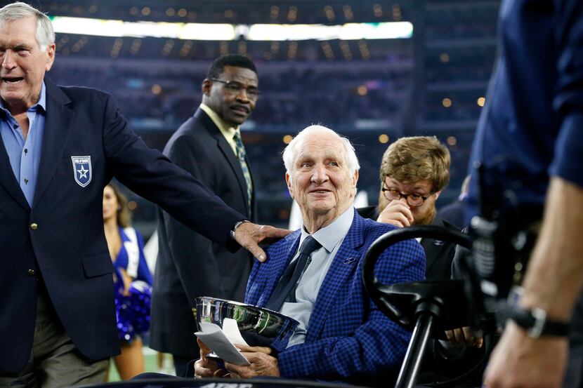 Dallas Cowboys owner Jerry Jones hands former Cowboys vice president of player personnel ...
