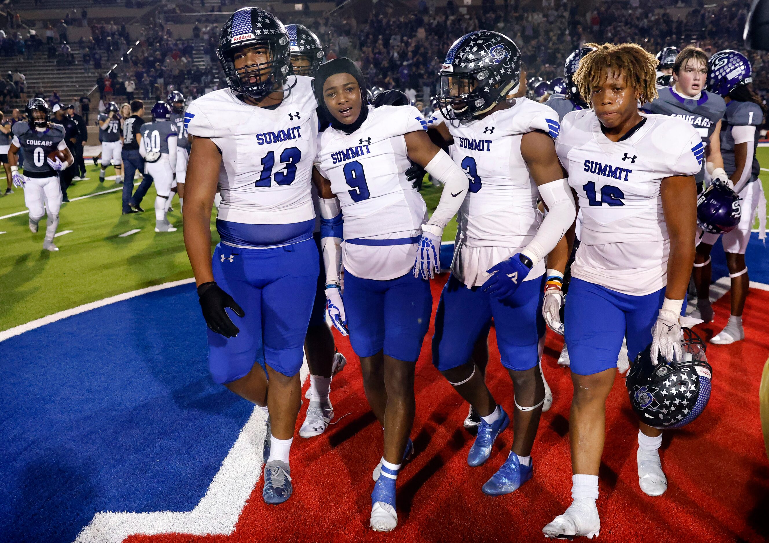 Mansfield Summit players, from left, Legend Journey, Tavare Smith Jr., Ahmaad Moses and...