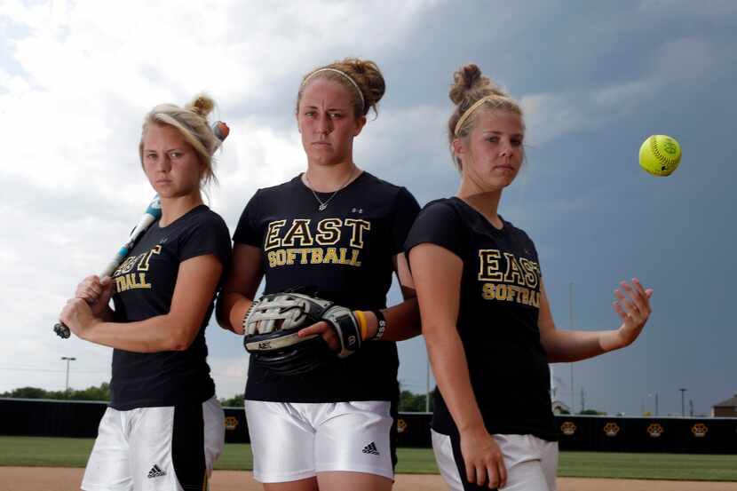 Plano East softball seniors Chandler Cink , Holly Kern, and Rachel Scott stand in the...