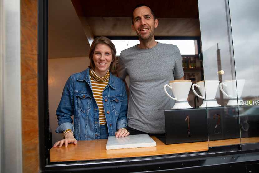Gina and Brian Milligan pose for a photo in their Coffee Folk Cafe truck on Jan. 10, 2020 in...